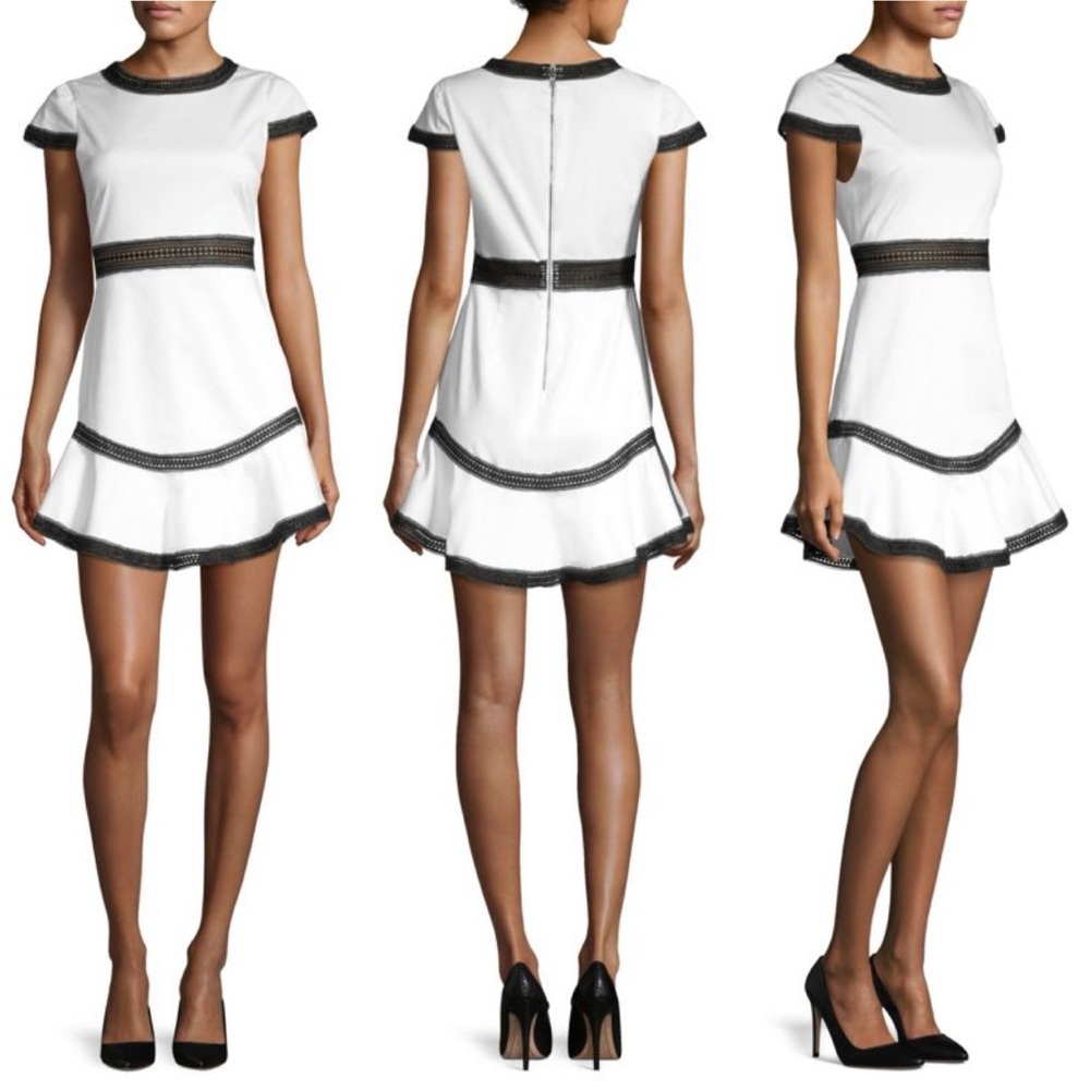 ALICE + OLIVIA | REVOLVE SAKS RAPUNZEL FLOUNCE MINI DRESS WHITE CROCHET ACCENT